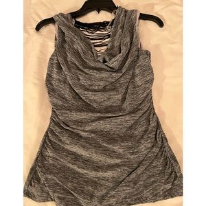 Tank Top with hang down fringe back.  Size medium.